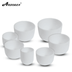 white frosted crystal singing bowls